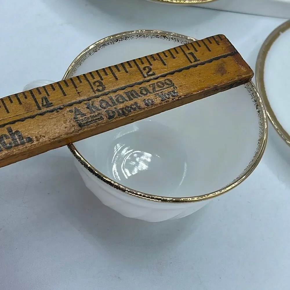 Set of 2 Fire King milk glass swirl pattern cup & saucers.
